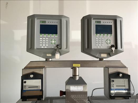 Metal detector checkweigher