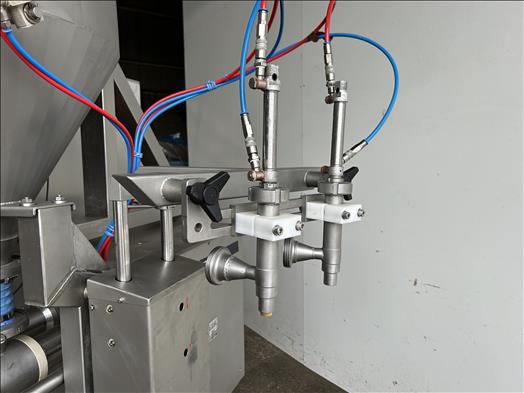 Twin head dosing machine