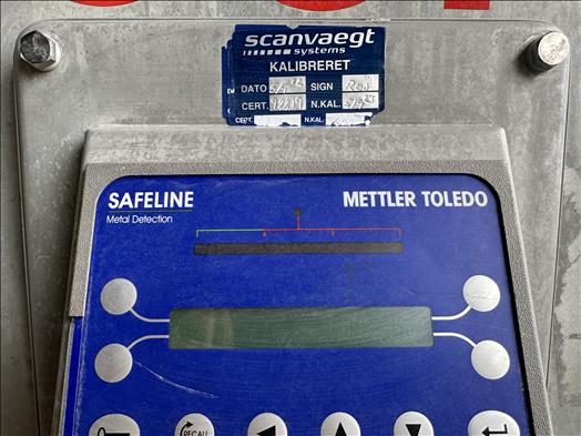 Metal detector checkweigher