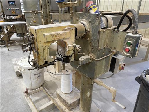 Sack stitcher machine